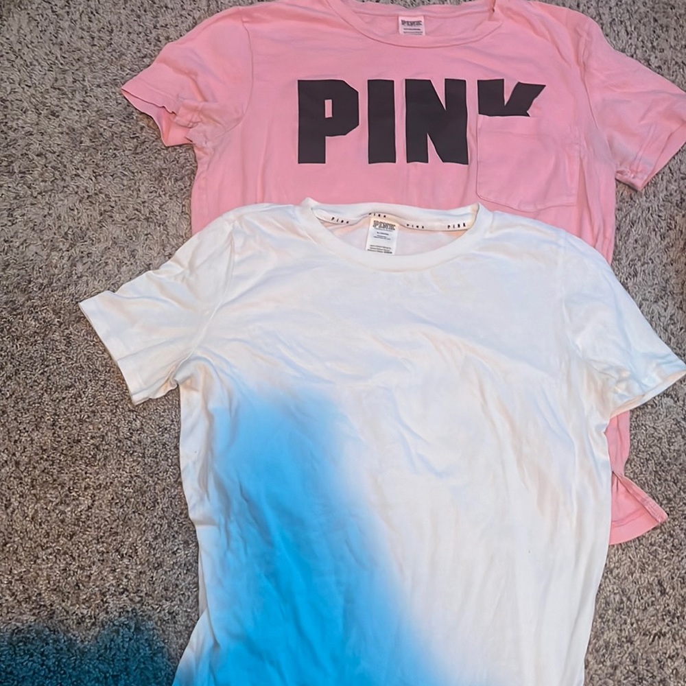 2 pink shirts